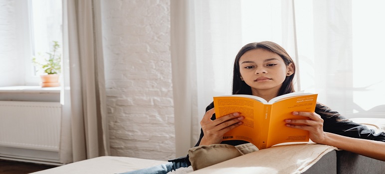 lady-reading-best-books-for-neet-entrance-examination-preparation