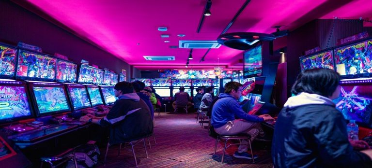 people-enjoying-video-games-on-a-game-parlour-business-center